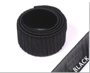Magic French Twist Hair Bun Maker tool for creating neat updos, shown in a compact flexible design
