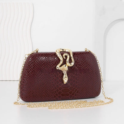 Women's stylish snake-print evening tote with sophisticated European-American design