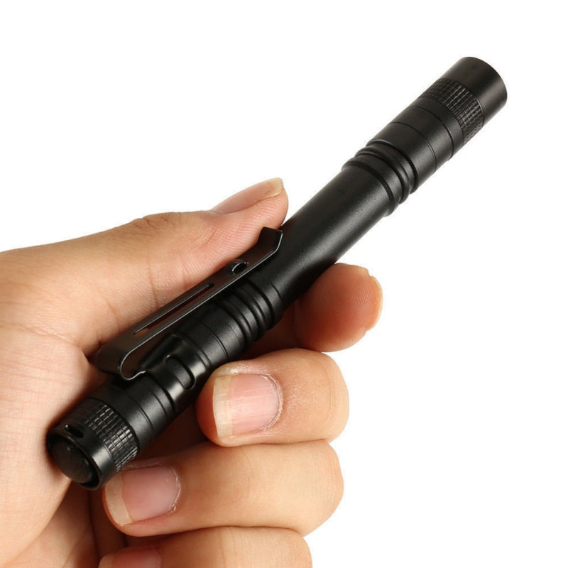 Aluminum LED flashlight, compact silver design with textured grip and bright front lens