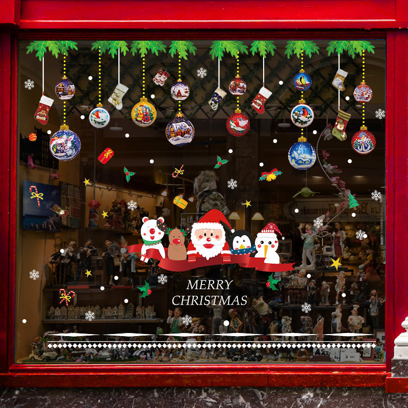 Christmas decorations store window stickers in festive holiday designs adhered to glass panes