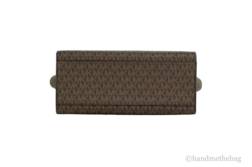 Brown Michael Kors Carmen Signature satchel with gold hardware and top handles, stylish and spacious handbag.