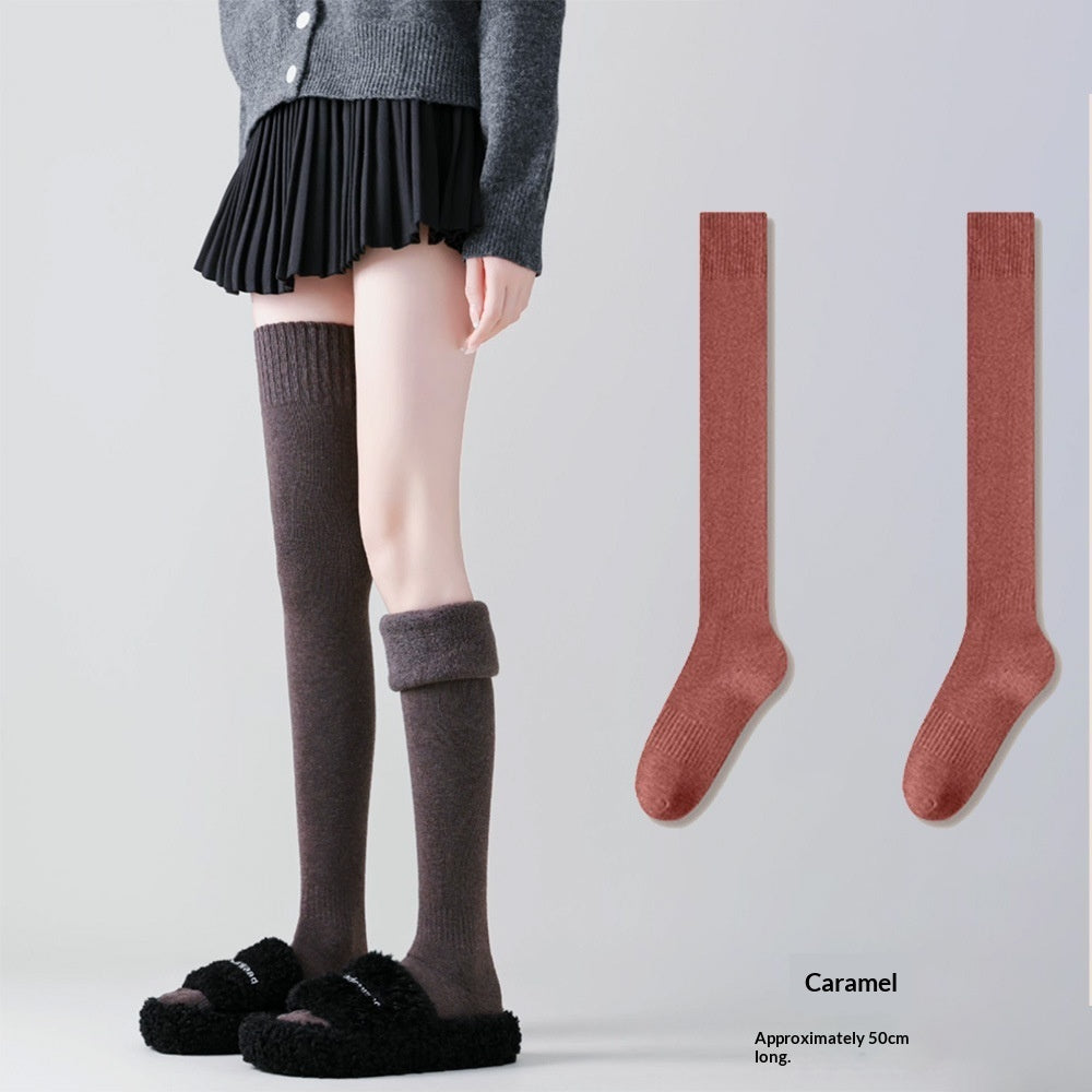 Extra-long women's compression over-the-knee socks in a close-up product view