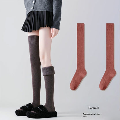Extra-long women's compression over-the-knee socks in a close-up product view