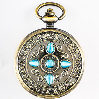 Retro flip-open mechanical pocket watch with a classic metal case and visible clock face