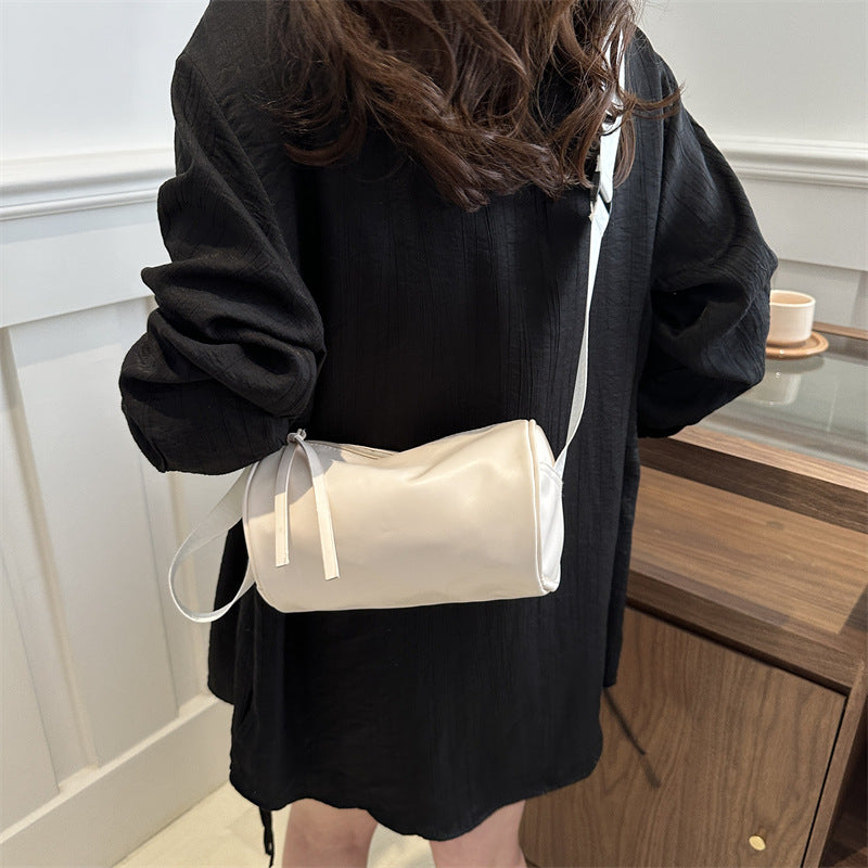 Simple fashion crossbody shoulder bag in a minimalist design, shown from the front