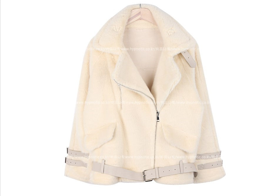 Women's leather coat with buckle and fur trim in a classic design
