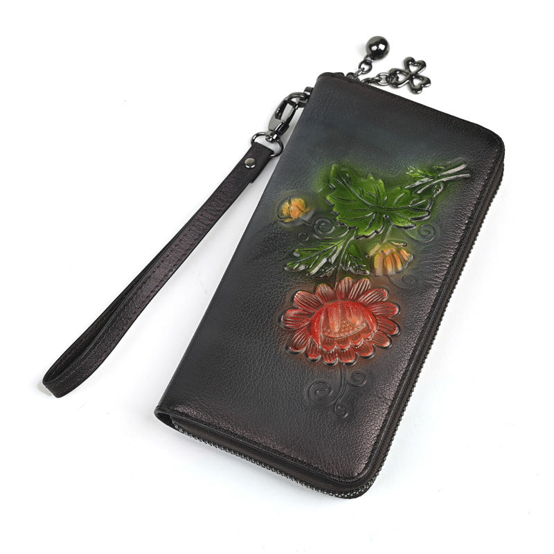 Embossed long wallet zipper clutch purse phone bag in a sleek fashion design