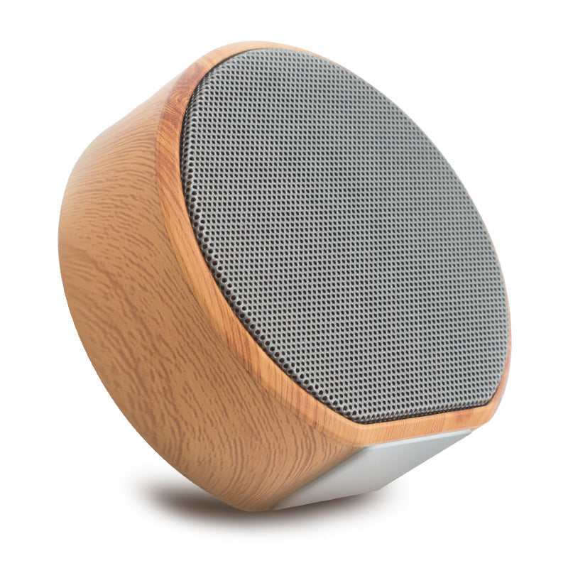 Wood grain Bluetooth speaker with natural wood finish and compact design