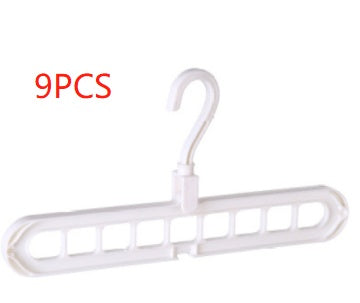 9-hole clothes hanger organizer, space-saving hanger design, shown in white plastic against a plain background