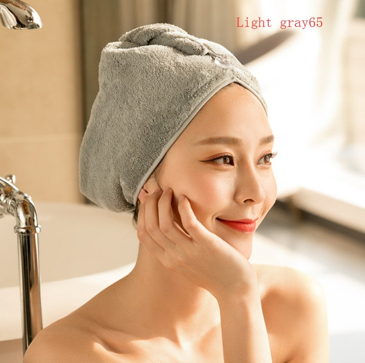 Women's absorbent hair dryer cap and dry hair towel in soft fabric, shown in a wrapped cap design