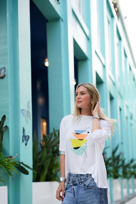 Soft beige Pima cotton "Mid Century" luxury boxy T-shirt by PLANET by Lauren G, shown laid flat with short sleeves.