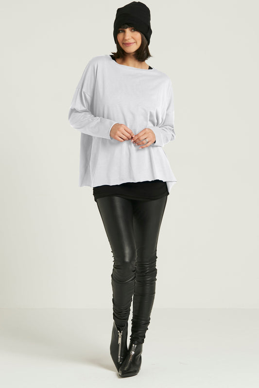 White Pima cotton luxury boxy T-shirt by PLANET by Lauren G, showing a comfortable, stylish fit with a soft fabric texture.