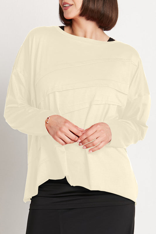 Cream-colored Pima cotton T-shirt by PLANET by Lauren G featuring a boxy fit and tucked design, casual and comfortable for everyday wear.