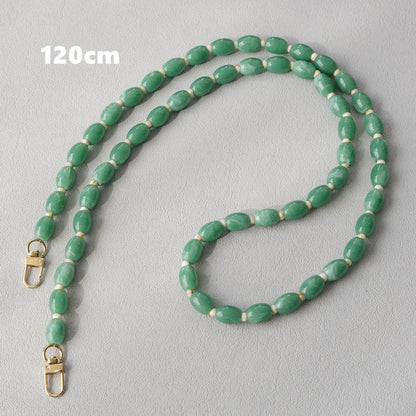 Beaded bracelet accessories shoulder strap in a fashionable design, displayed on a plain background