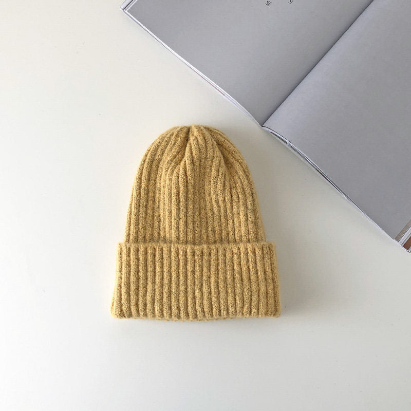 Warm knitted hat from My Store in soft textured fabric.