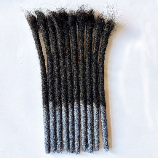Fashionable hand-crocheted human hair dreadlocks, close-up view of textured strands