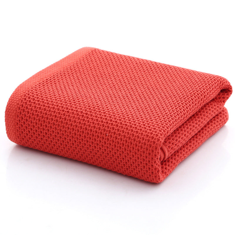 100% cotton honeycomb face towel with textured weave, folded and displayed flat