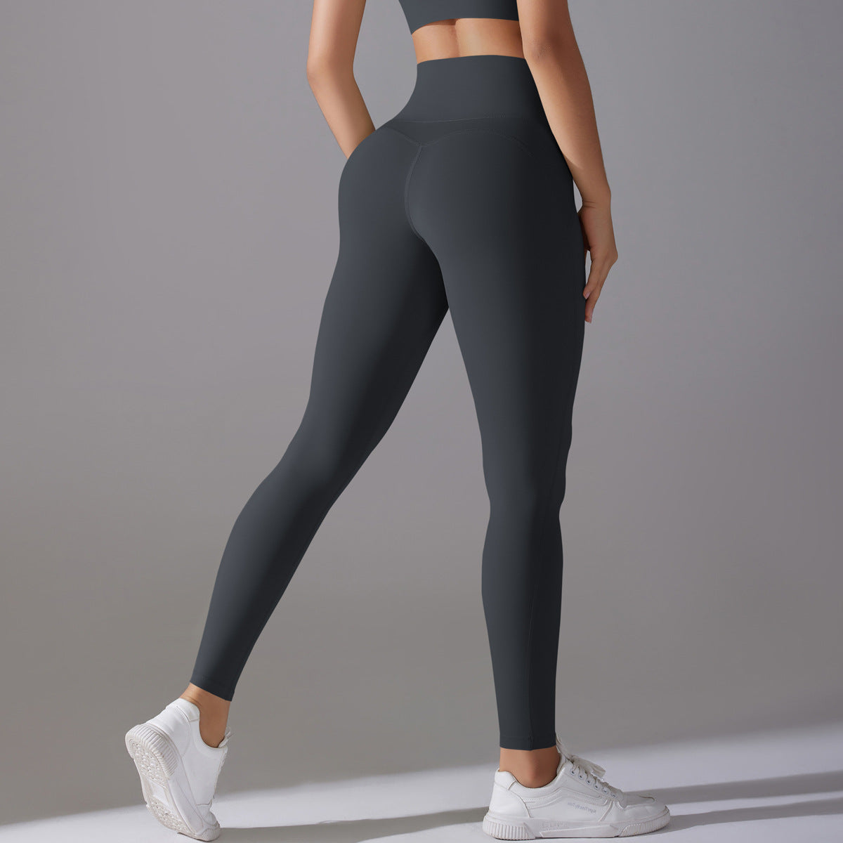 Women’s high waist hip lift yoga pants in nude feel fabric, shown in a fitted hot pants style