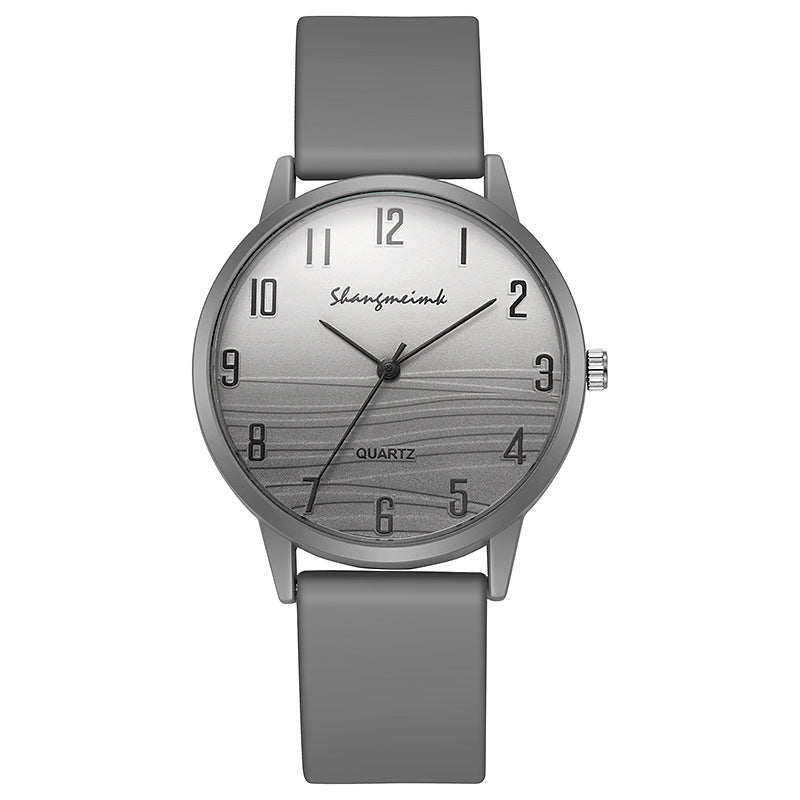 Casual simple jelly color women's watch with a translucent band and minimalist round dial