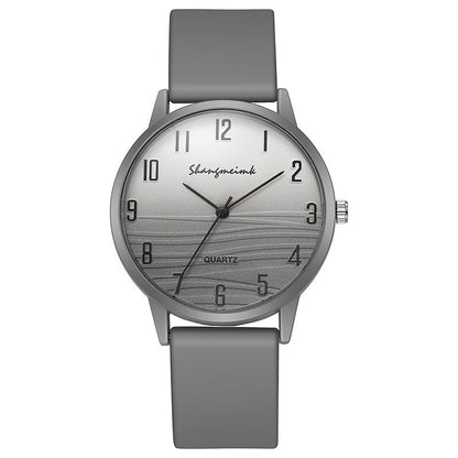 Casual simple jelly color women's watch with a translucent band and minimalist round dial