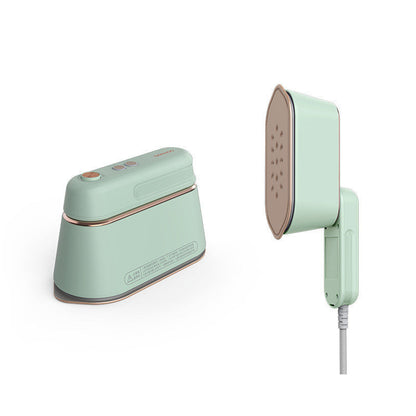 Small handheld steam iron for clothes, ideal for home and travel, from Sell My Stuff, with a compact design and ergonomic handle.