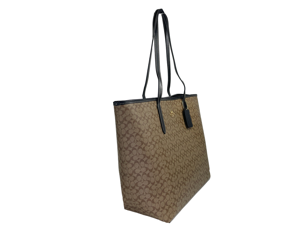Coach Khaki Signature City Tote Bag with top handles and spacious interior, stylish purse for everyday use.