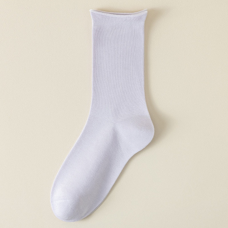 Women's springsummer mid-calf silk socks; soft fabric and classic sock design visibly shown