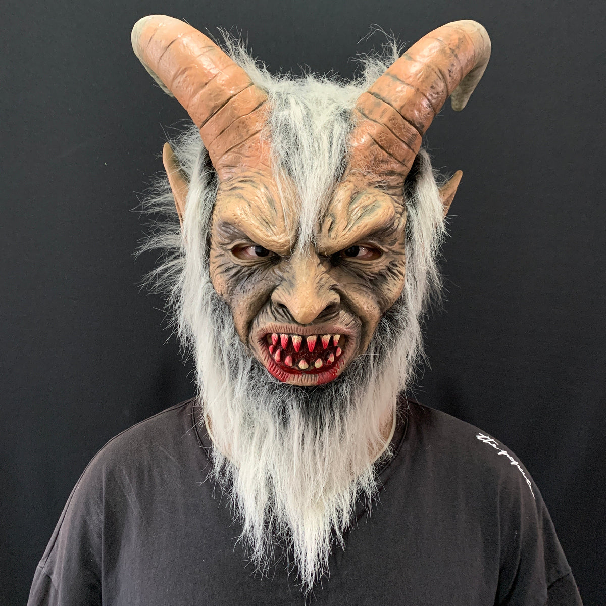 Lucifer mask with realistic human face design, close-up view