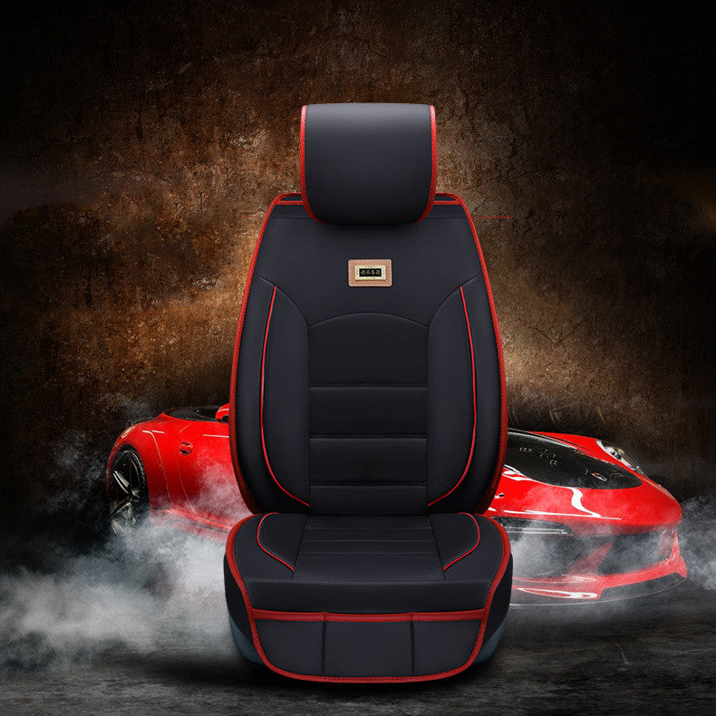 Car seat cushion cover in black fabric, close-up view of fitted seat protection for vehicle interiors