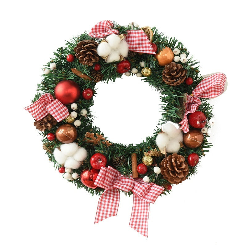 Christmas garland bow door hanging with festive red and green decorations for a window or entryway