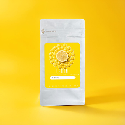 Roasted Colombia Caturra coffee beans from Good Brothers Coffee LLC displayed in a close-up image.