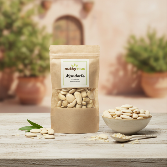 Raw NuttyPlus peeled almonds, a natural dried fruit snack with authentic taste, displayed in a close-up image.