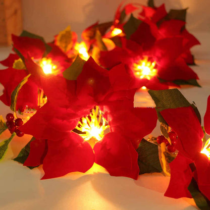 Red flower string lights decorating a door frame and escalator