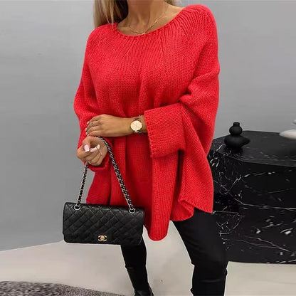 Women's winter oversized knitted pullover sweater with loose batwing sleeves and shawl-style neckline