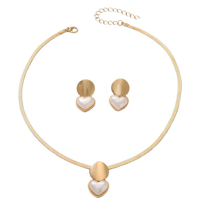 Women's creative round heart-shaped pendant necklace on a delicate chain, front view