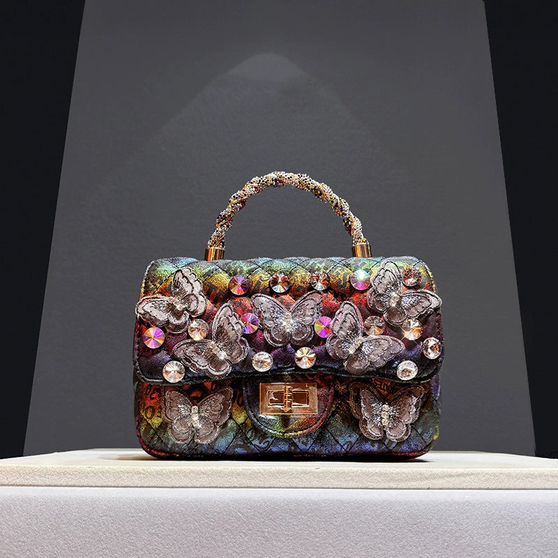 Fashionable single-shoulder crossbody bag with diamond pattern, shown in detail