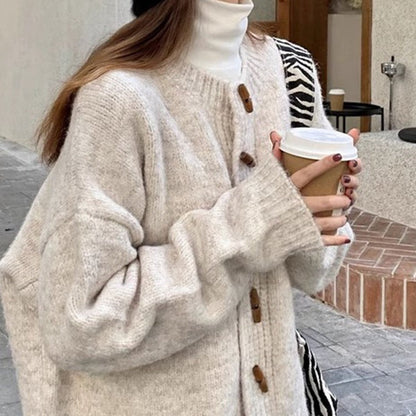 Knitted cardigan outerwear top in idle style, featuring textured knit fabric and button-front design