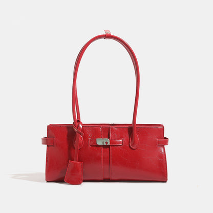 Women's versatile commuter handbag with luxurious feel and large capacity, shown in a structured design