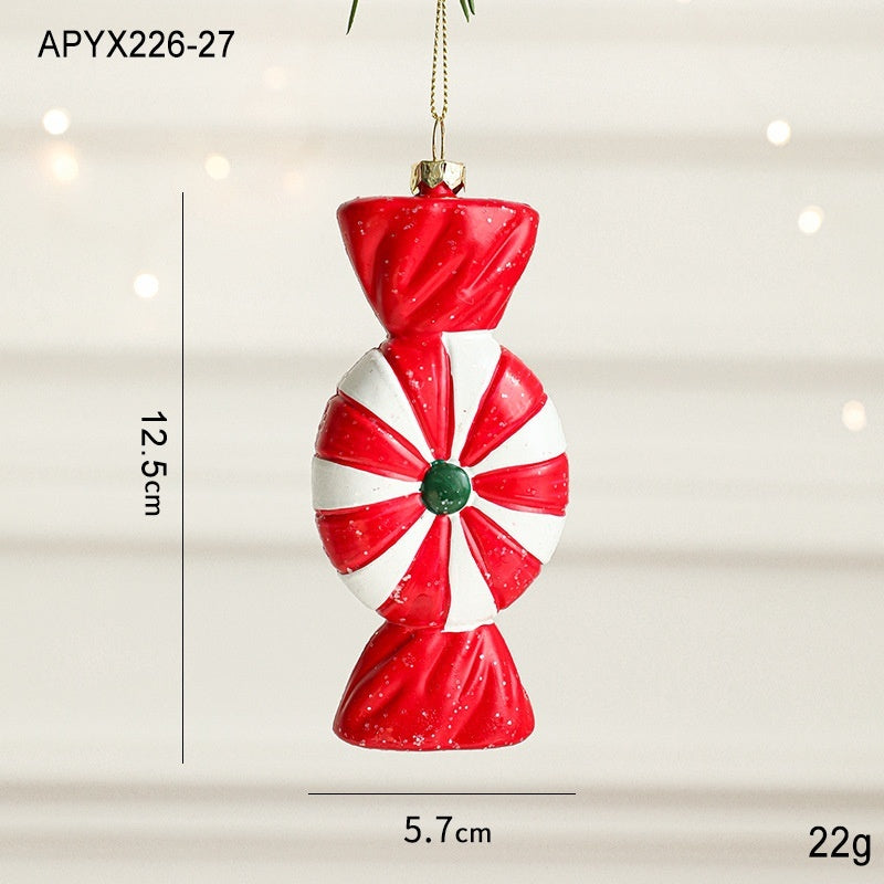 Painted plastic Christmas tree pendant decoration with festive holiday details