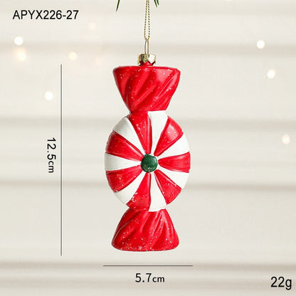 Painted plastic Christmas tree pendant decoration with festive holiday details