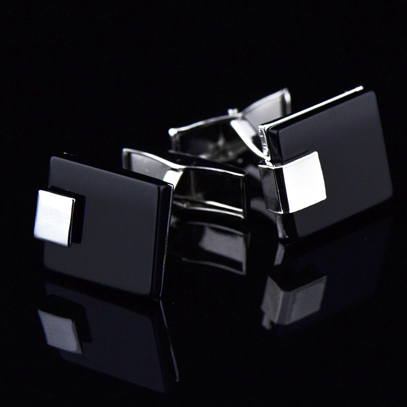 Black agate business cufflinks with polished stone inlays and silver-tone metal settings