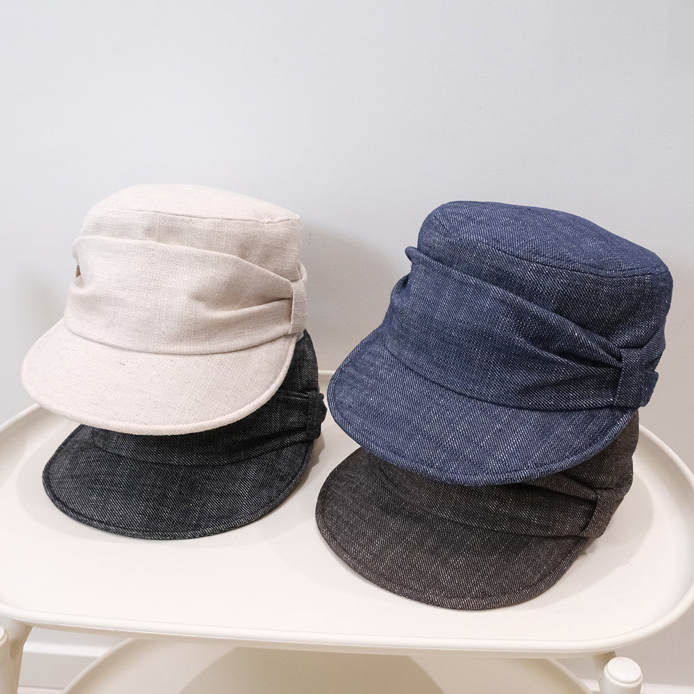 Old money style retro ruffled flat top bowler hat with artistic vintage design
