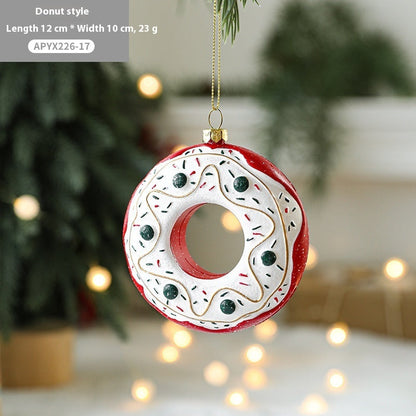 Painted plastic Christmas tree pendant decoration in festive holiday design