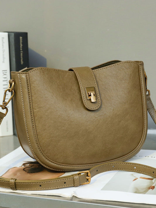 Genuine leather women’s half-moon saddle bag in brown cowhide with single-shoulder crossbody strap