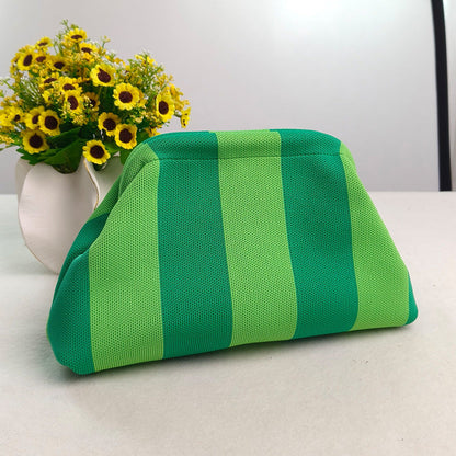 Women's knitted striped clutch bag in a textured woven design