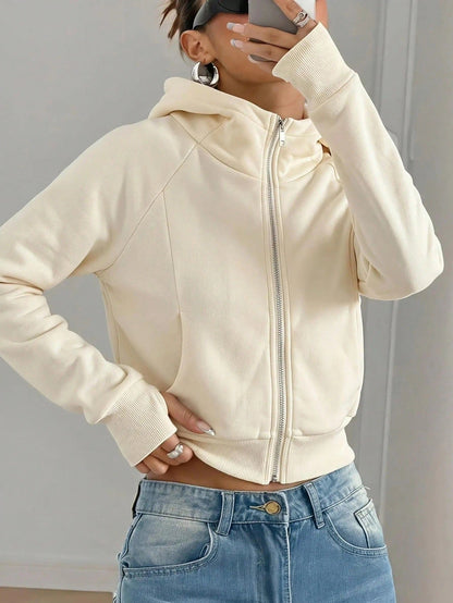 Solid-color cropped hooded sweatshirt for women, featuring a simple pullover design and adjustable drawstring hood