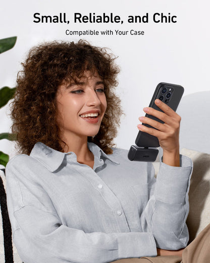 Anker Nano 22.5W power bank with built-in USB-C connector, compact portable charging device.