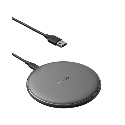 Anker 313 wireless charging pad for fast, cable-free charging of compatible smartphones and devices.