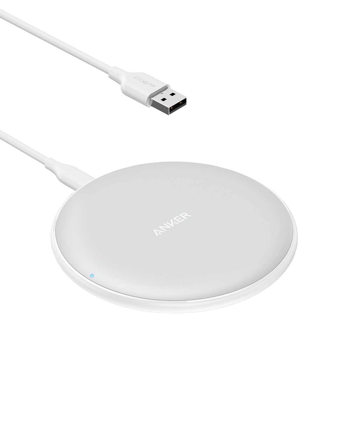 Anker 313 wireless charging pad for charging devices, slim black pad with charging indicator light on smooth surface.