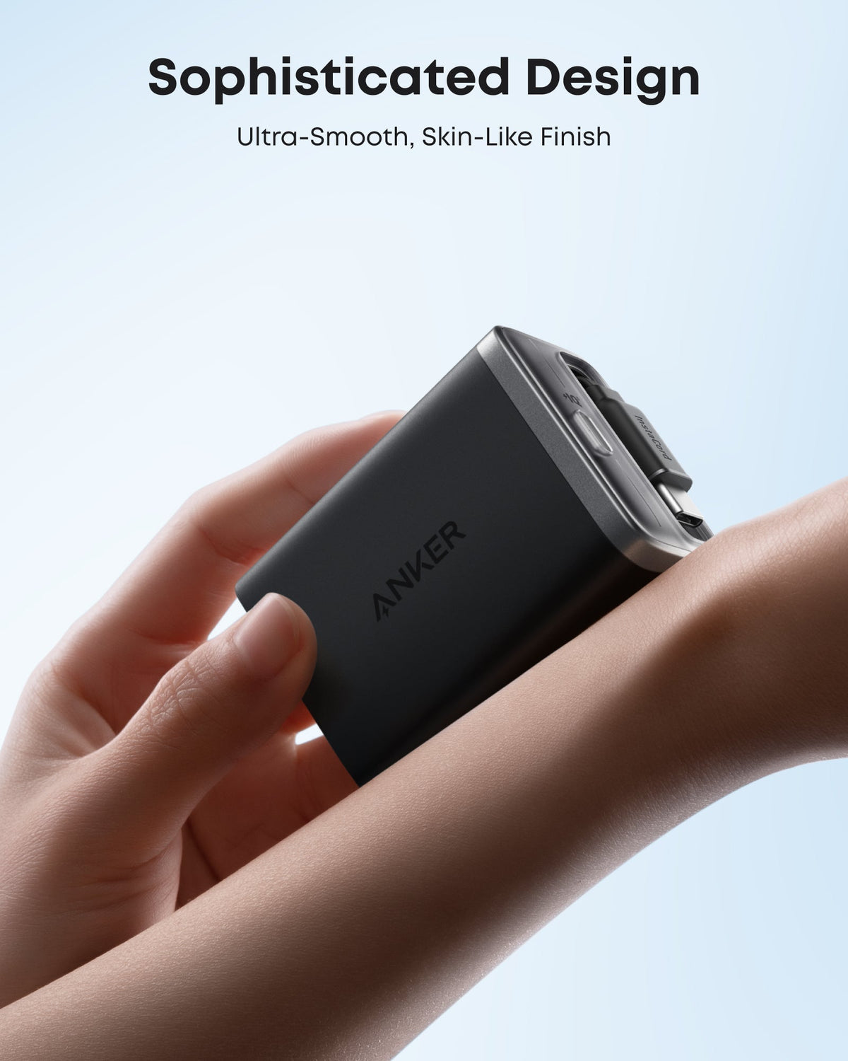 Anker Nano 35W charger with built-in retractable USB-C cable, compact and portable for fast device charging.